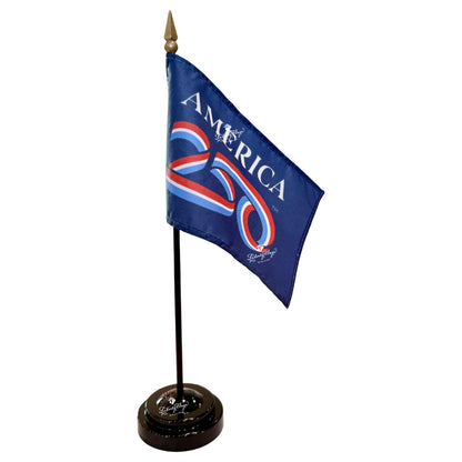 America 250 Logo Small Flag with glossy black plastic display base, 4"x6" flag on black staff with gilt spear ornament